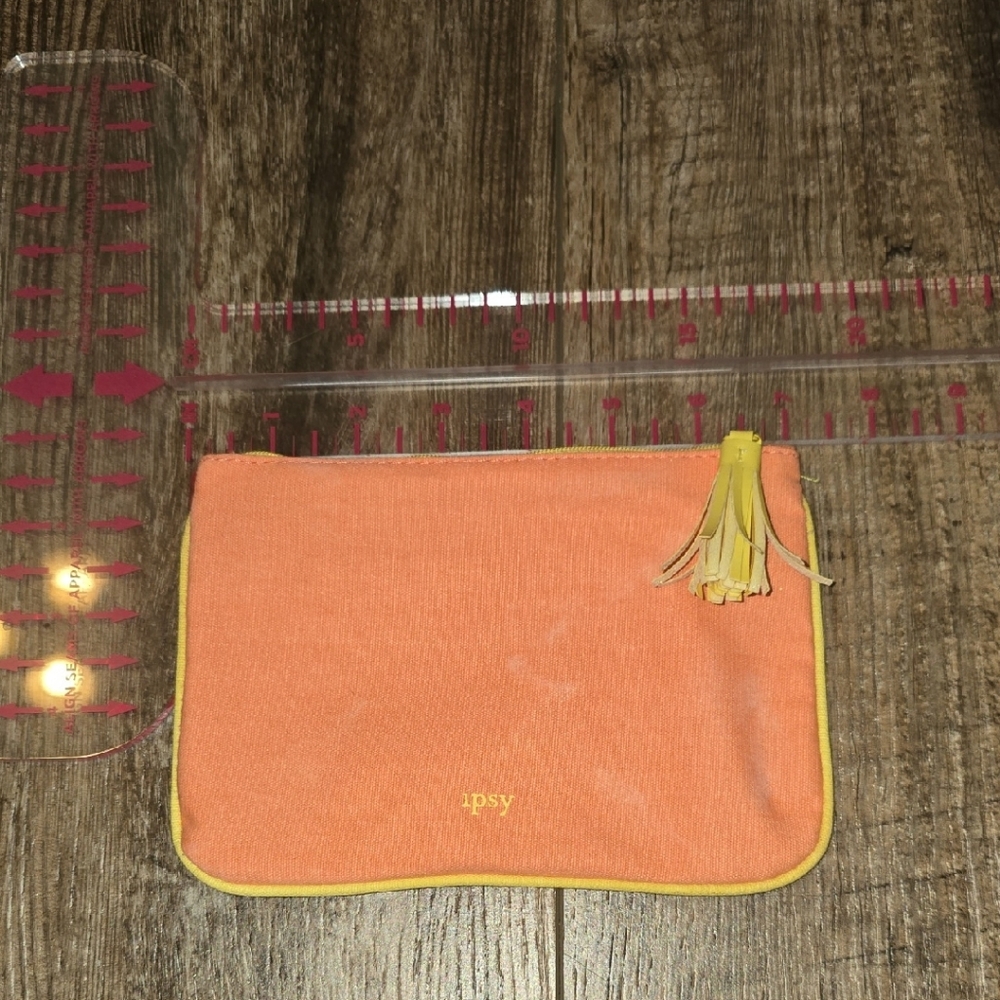 Ipsy Orange Pouch with Yellow Tassel